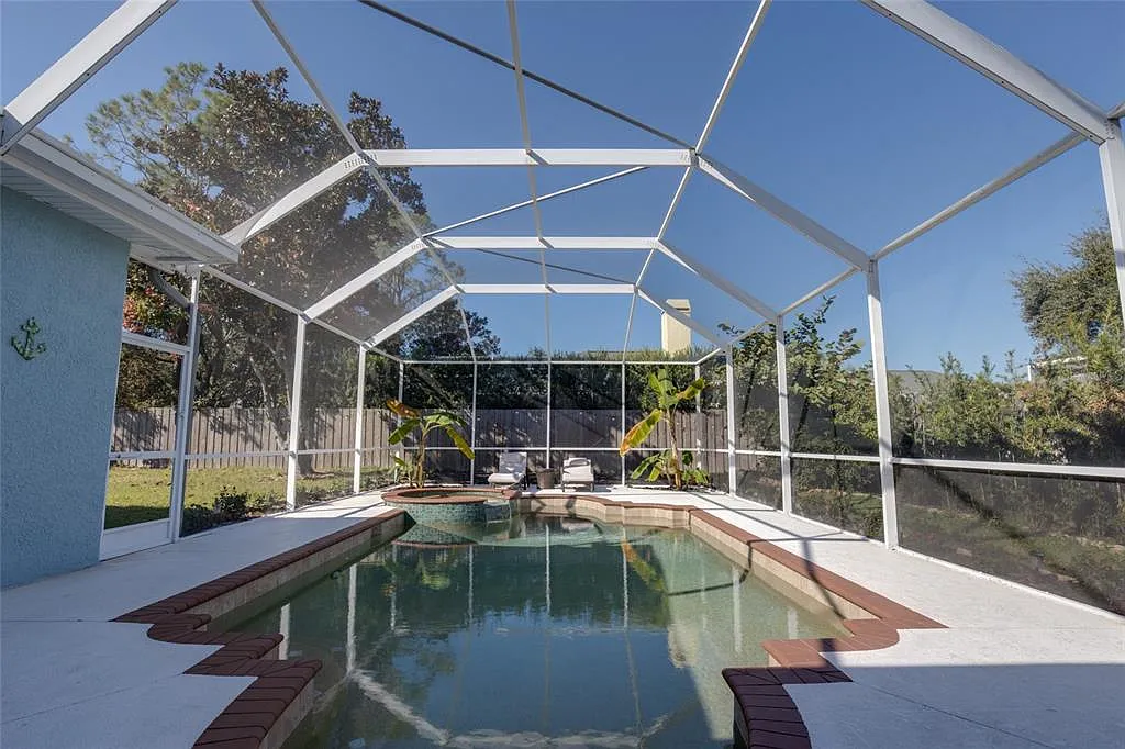 Pool with spa and covered patio